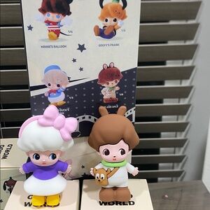 Disney Action Figure Set with Red, Blue, and Brown Accents Set of 2 blind boxes